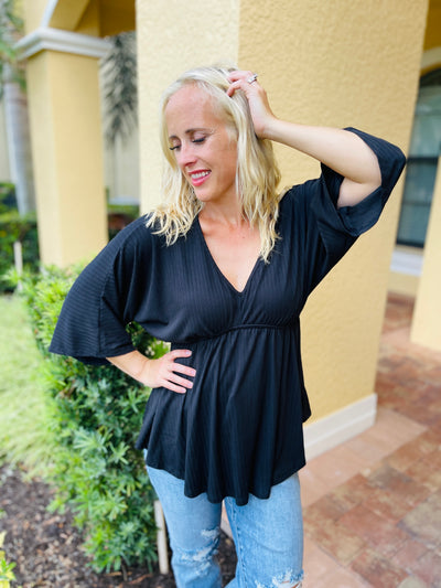 Storied Moments Draped Peplum Top in Black