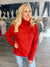 Steady Pace Roll Neck Sweater In Red